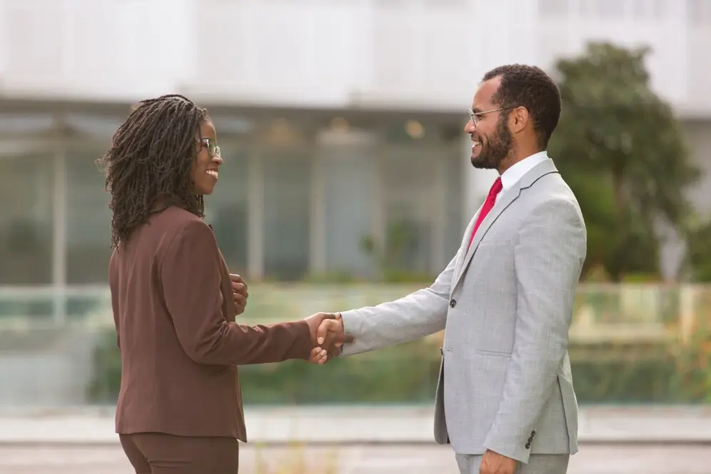 Successful Multiethnic Business People Greeting Each Other